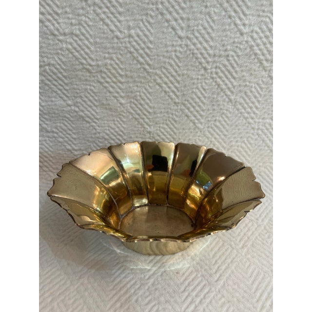 This solid brass planter or cachepot is the perfect size to fill an empty space in a shelf, hold a small orchid or use on...