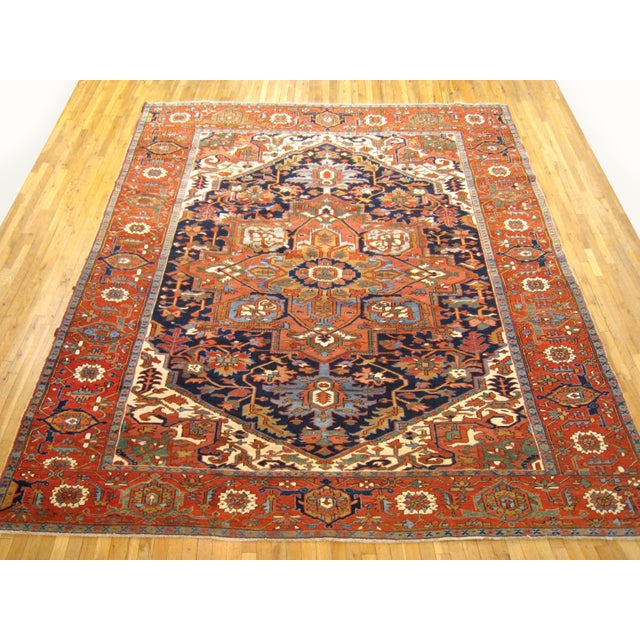 Antique Persian Serapi Oriental rug, in Room size An antique Persian Serapi oriental rug, size 12'7" x 9'8", circa 1910....
