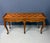 A refined French Provincial console table by Baker Furniture, showcasing the brand’s hallmark craftsmanship and timeless...