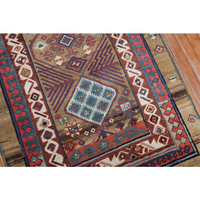 Highly collectible full pile Persian Serab runner with a camel ground and geometric motif. The colors, quality, geometry,...