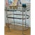 This stylish, modern and sleek vintage bar cart features a heavy chrome construction with 3 thick clear glass oval shelves...