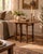 Classic English practicality, with better legs. This Antique British oak gateleg table combines a compact drop-leaf design...