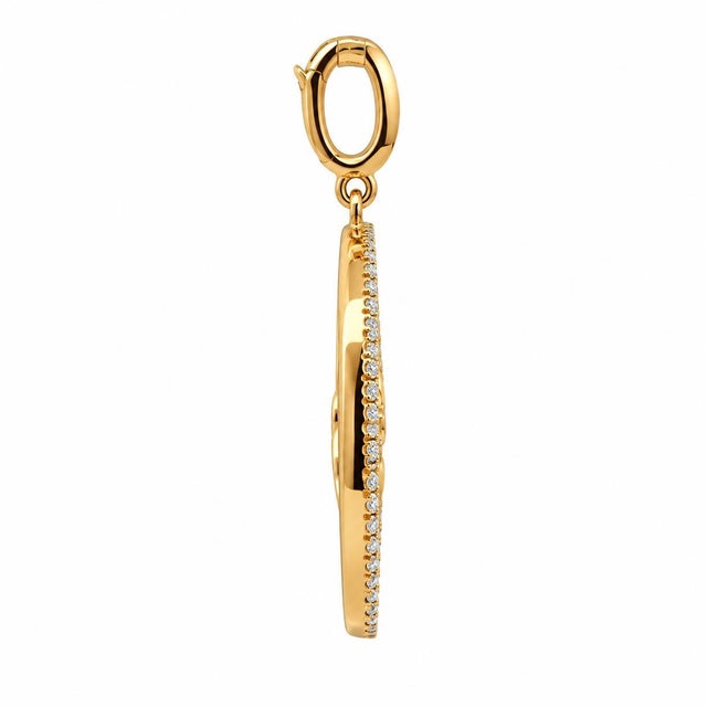 An authentic fine jewelry astrological statement pendant crafted in solid 14k yellow gold. Featuring a stylized Pisces...