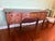 The Charak Mahogany Federal Serpentine Front Server is a vintage sideboard made of mahogany with a brass handle finish....