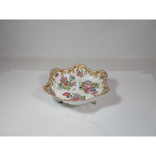 An exquisite French porcelain bowl, produced by the. Max Eugene Claus/Bourdois and Bloch Co, in Paris France, between 1868...