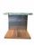 Elegant end table featuring a richly veined green onyx top paired with a warm wood base, creating a striking contrast...