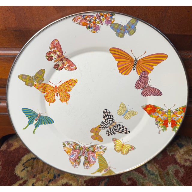 Whimsical MacKenzie-Childs enamel metal serving plate featuring a vibrant array of signature patterned butterflies set...