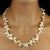 This is part of Chairish’s Fine Jewelry assortment. Chic 27-Inch Peachy Freshwater Pearl Necklace – A Wardrobe Essential...