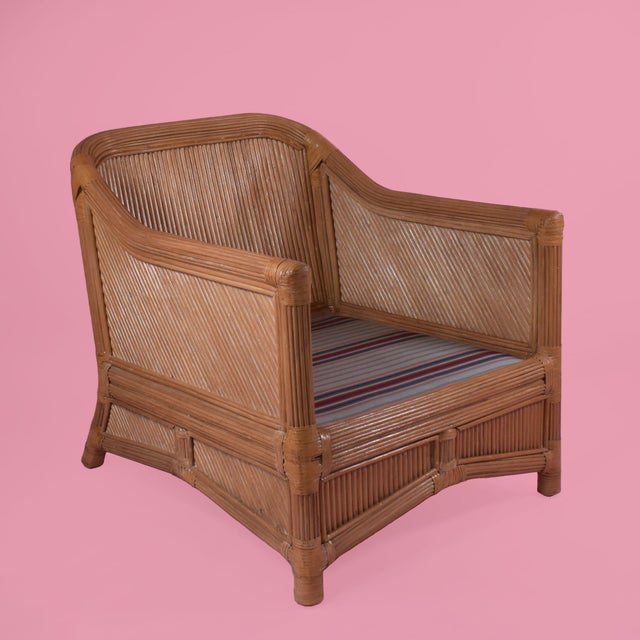 Pair of Split Rattan Tube Chairs in nice as found vintage condition. There are minor scuffs, scrapes and wear to the...