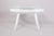 White mid century table made in the 1950s in Czechia. Designed by František Jirák and made by Tatra Nábytok. The table is...