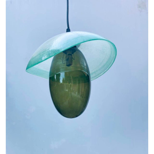 Iconic lamp designed by Mariana Iskra for Ribo the Art of Glass. Made of G9 glass. Ideal for an entryway or above a table...