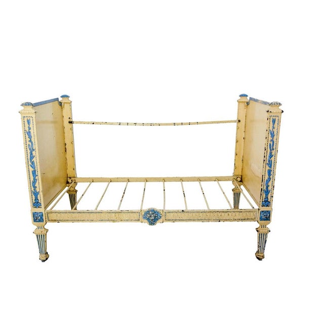 French banquette sofa iron and wrought iron painted. It was a child bed in the late 19th century, ans it can be used as...