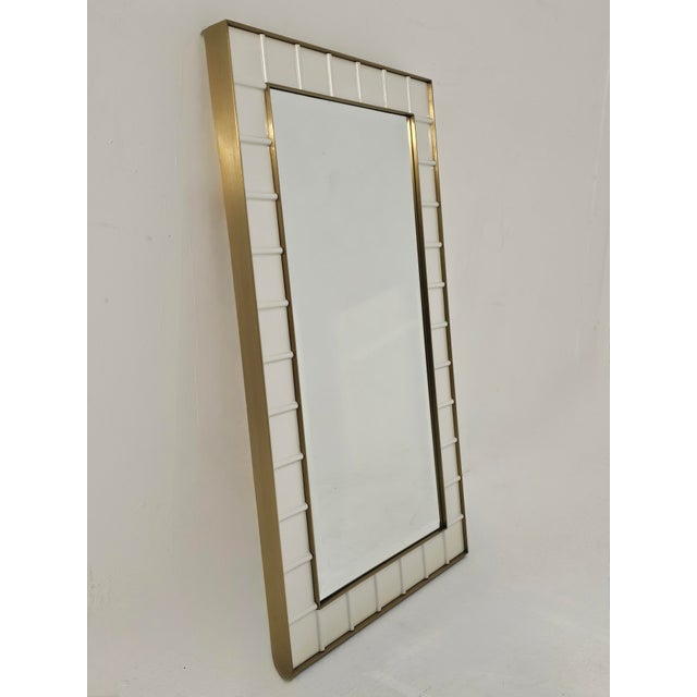 Lacquered beechwood frame. Mother-of-pearl lacquer, interior and exterior brass trim with a bronze finish. Extra-clear...