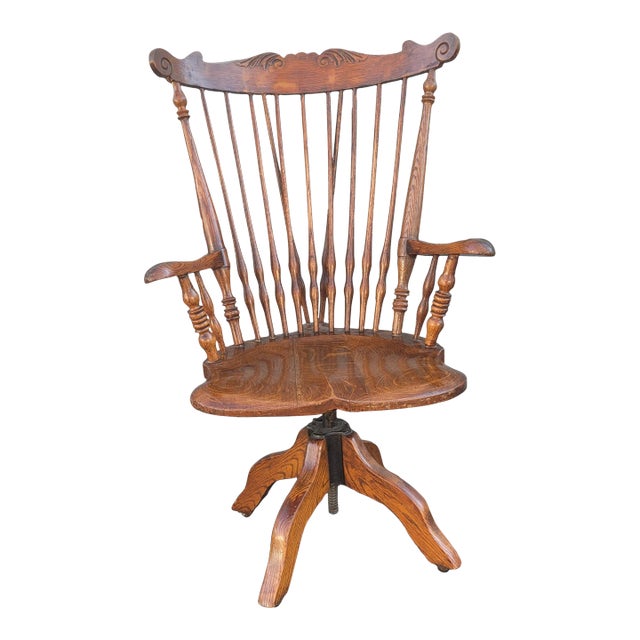 1930s Fiddleback Oak Windsor Style Tilting and Rolling Desk Chair With Saddle Seat For Sale