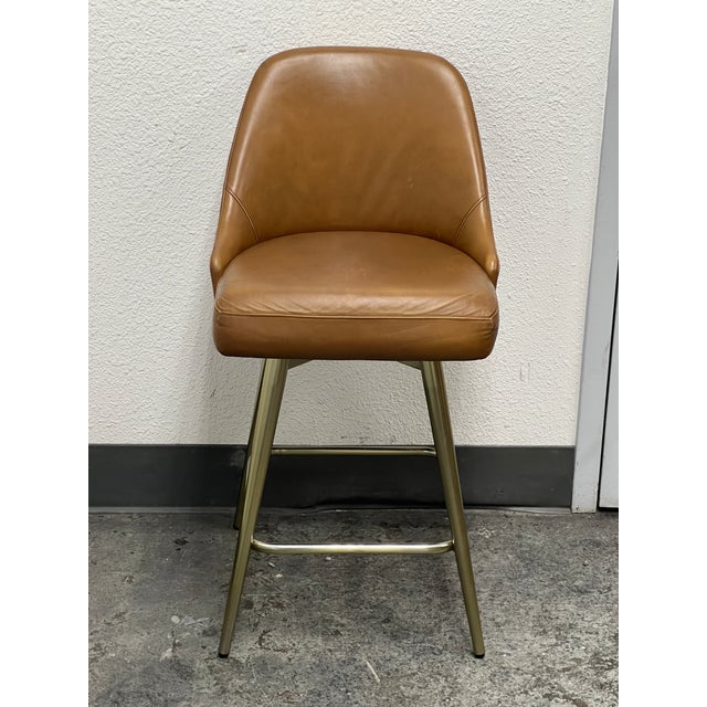 Design Plus Gallery presents a Mid Century Swivel Stool from West Elm. Presents timeless mid-century design to your space...
