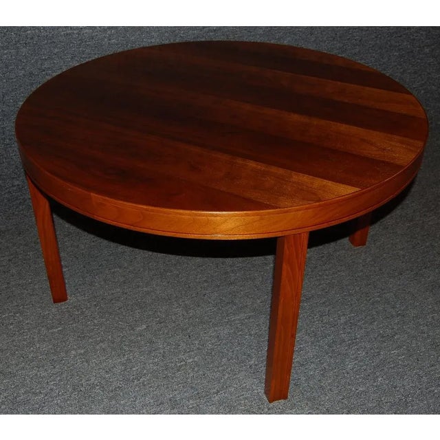Round walnut table by renowned Swedish furniture designer Carl Malmsten (1888 - 1972). Versatile size - can be used as end...