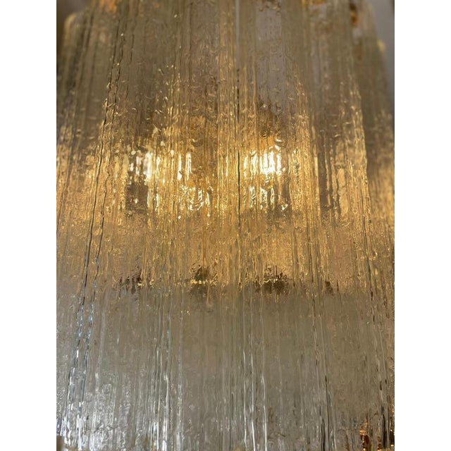 “Tronchi” chandelier in Murano glass, produced by Venini in the 1960s. An elegant example of Italian mid-century design,...
