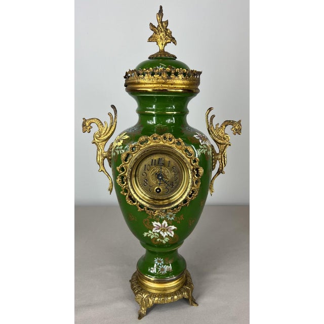 Antique French Garniture Set – Clock & Candelabras (Lot 3620) An exquisite antique French garniture set, featuring a...