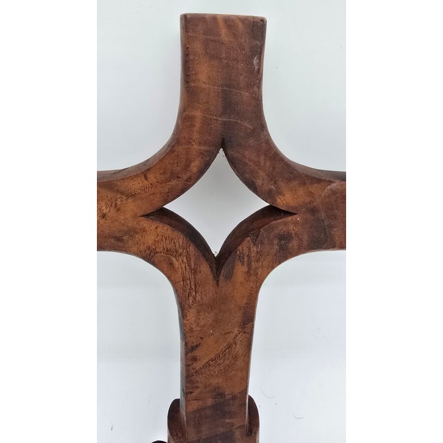 Description: Made of wood Metal clamp on base of cross Decorative design Condition: Excellent Minor signs of age and use...