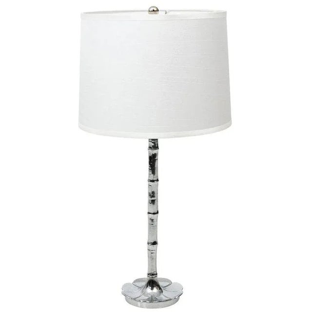 Faux bamboo Hollywood Regency style chrome lamp, newly rewired. Shade not included, circa 1970s.