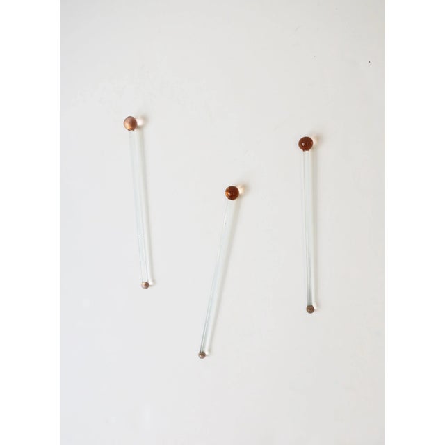A beautiful set of three (3) Art Deco period pink and transparent clear art glass cocktail stirrers, circa early-20th...