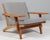 Hans j. Wegner lounge chair with loose cushions new upholstered with hallingdal wool from kvadrat frame of oak. With...