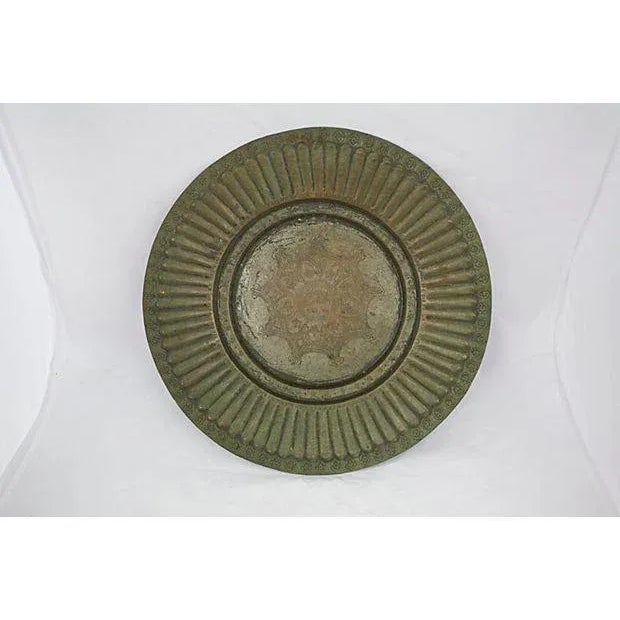 Antique hand-crafted copper bowl with engraved elephant center motif and scalloped rim detail. Stamped mark reads "China".