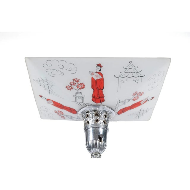 Rare art deco geisha torchiere lamp from the mid 20th century. Chromed base with two geisha figures, glass shade decorated...