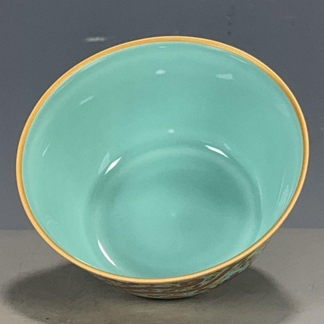 Elevate your tabletop or display shelf with this striking ceramic bowl featuring classic Chinese imagery. This decorative...