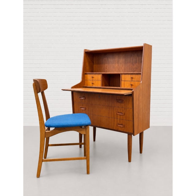 Mid Century Modern Danish secretary desk in warm teak, boasting tons of delicious design details and a highly functional...