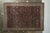 Handmade in wool originating from India circa 1890-1900, this antique 6x9 rug features an uncommon colorway pagination...