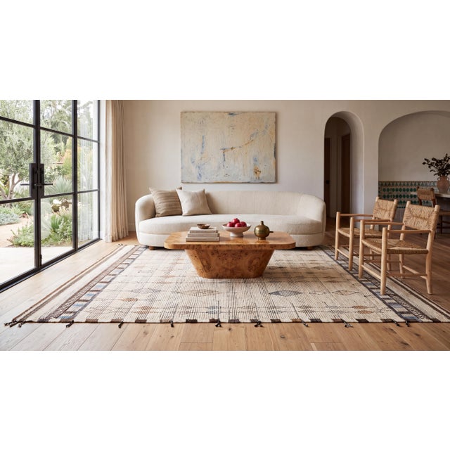 Elevate your space with this exquisite contemporary wool rug, thoughtfully crafted to blend traditional Moroccan tribal...