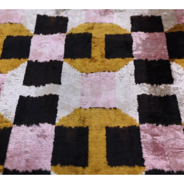 "Striking, sophisticated, and impeccably tailored, this handmade silk velvet throw pillow transforms bold geometry into an...