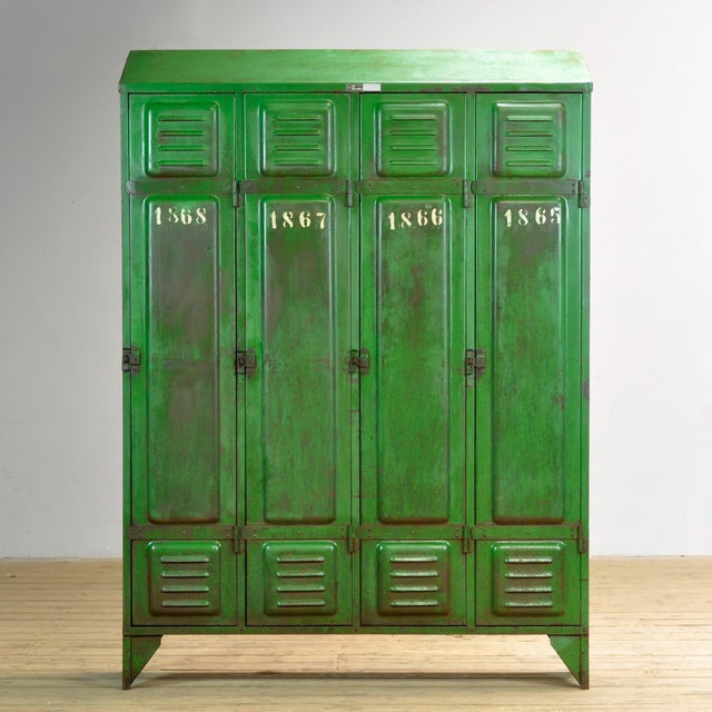 This locker was made in France around 1950 and features four compartments to store all your belongings. The upper section...