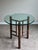 Exceptional vintage McGuire round table featuring the iconic handcrafted bamboo and rattan construction for which the...