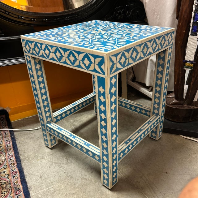 Beautiful and cheerful handmade bone inlay side table or seat. The blue is dyed bone using natural permanent pigments. The...