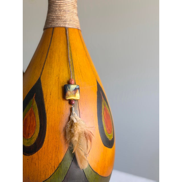 African Vintage Midcentury African Bentwood Pitcher Vase With Sculptural Neck and Curving Handle, Teardrop Accents, Feather and Stone Tassel Detail For Sale - Image 3 of 12