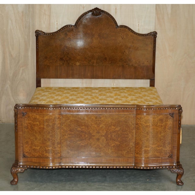 This is a stunning circa 1950's waring & gillow burr walnut bedstead frame with vono rails retailed through harrods london...