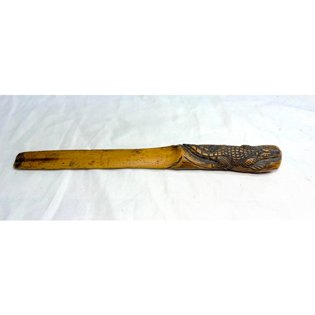 This antique hand-carved wooden alligator Folk Art page turner/letter opener is a unique and hand sculpted piece. Crafted...