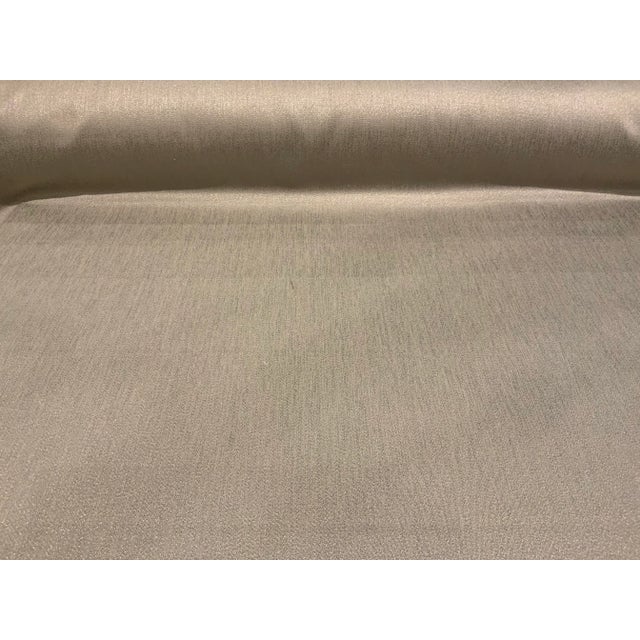 This fabric has a light gray to platinum colorway a soft gentle hand. It is suitable for drapes, upholstery, pillows,...