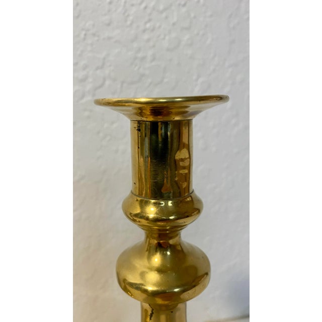 Stunning Pair of Antique 19th Century Brass Push-Up Candlesticks From England. Each Measures 8 1/4” T x 4 1/4” W x 4 1/4” D