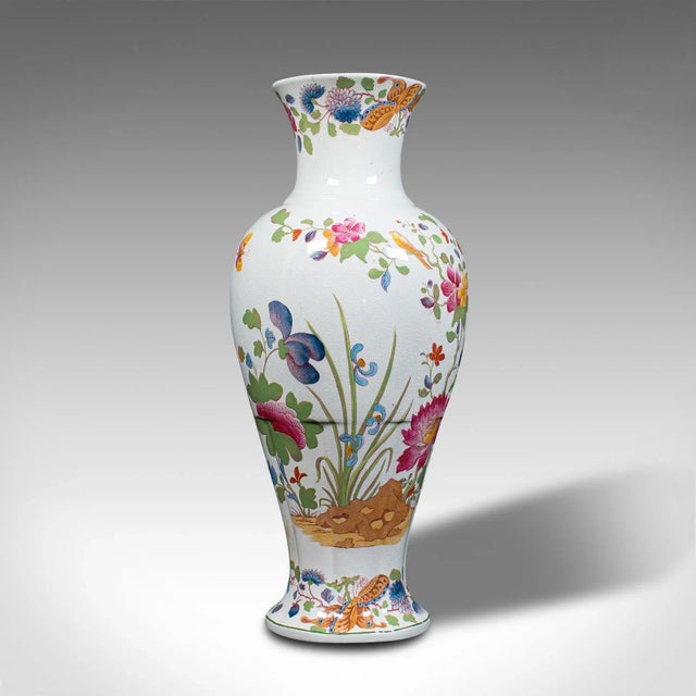 This is an antique baluster posy vase. An English, ceramic decorative flower urn, dating to the early 20th century, circa...