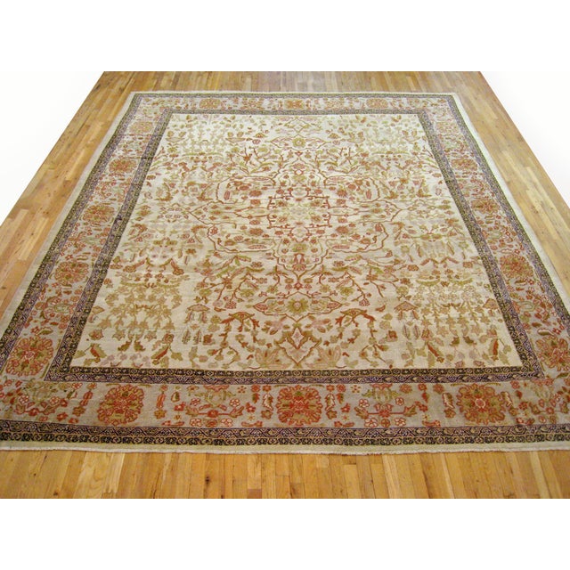 Antique Persian Sultanabad rug, room size, circa 1900 A one-of-a-kind antique Persian Sultanabad oriental carpet with a...