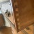 Brown 1920s French Louis XVI Style Tall Chest With Book Matched Walnut Veneer and Brass Accents For Sale - Image 8 of 9