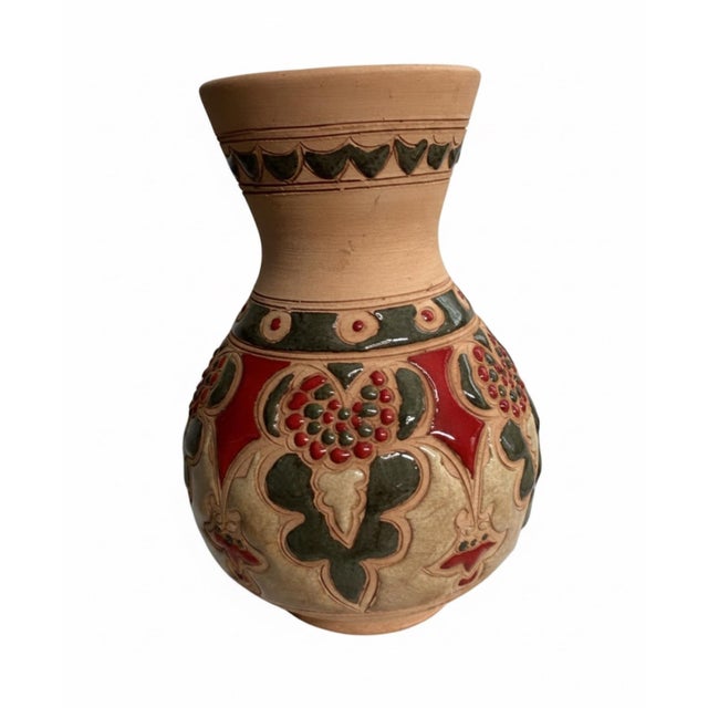 A distinctive vintage handcrafted pottery vase from Rhodes, Greece, signed BONIS on the underside. The vessel features an...