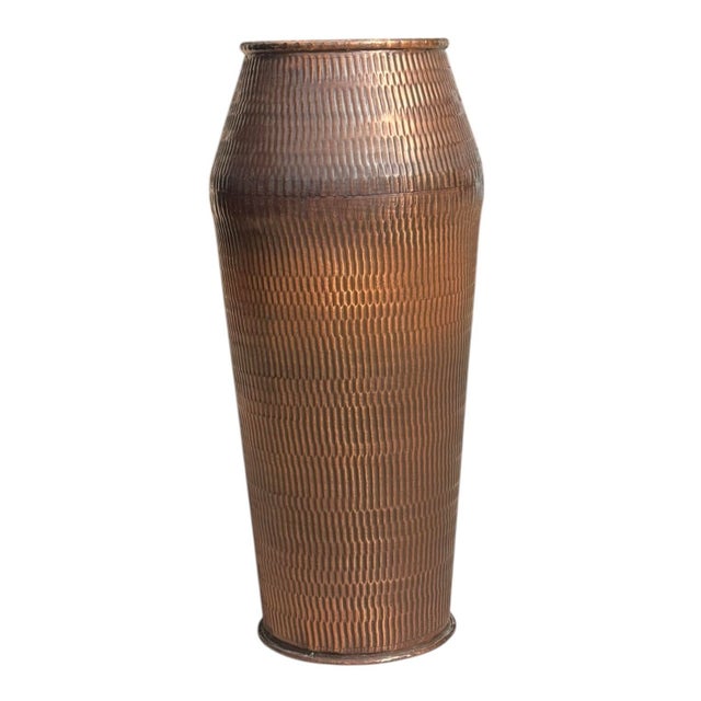 Beautiful hammered copper vase.