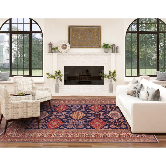 Enhance your home with this exquisite hand-knotted Super Kazak rug, crafted from fine hand-spun wool and dyed with all-...