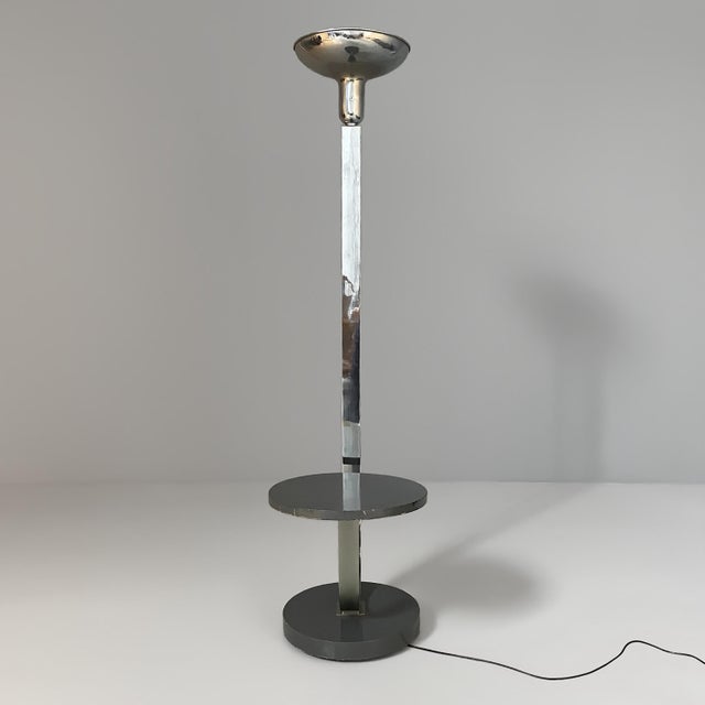 Italian art deco floor lamp with integrated table, 1930s Floor lamp with integrated table in chromed metal. It features a...