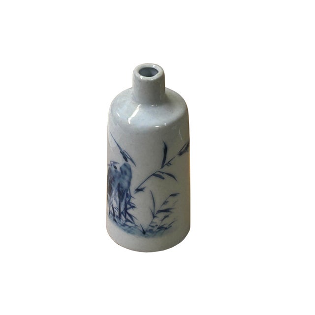 This exquisite, finely proportioned small vase stands 5 inches tall and features a cylindrical silhouette with a classic,...