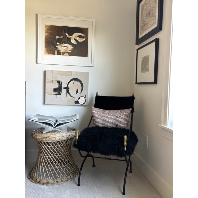 Organic modern, coastal round wicker side table with hourglass design CIRCA: Mid-20th Century MAKER'S MARK: None...